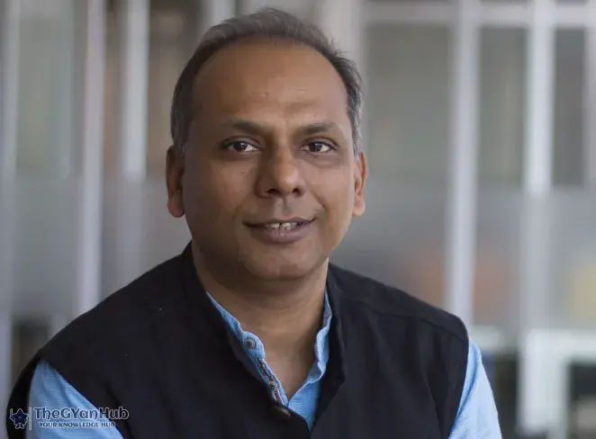 Portrait of venture capitalist Manish Singhal against a futuristic tech background