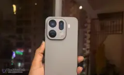 Oppo Find X9 Pro smartphone displayed on a table, showing its curved AMOLED screen and sleek metal design