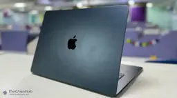 Apple MacBook displayed on a study desk designed for students with budget-friendly pricing