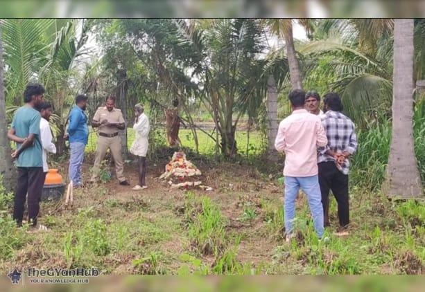 Police officers escorting a woman and her partner after their arrest in connection with a baby’s death