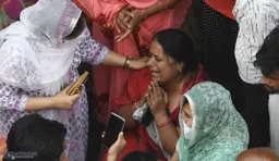 Police investigating a crime scene related to a ritual killing in Rajasthan